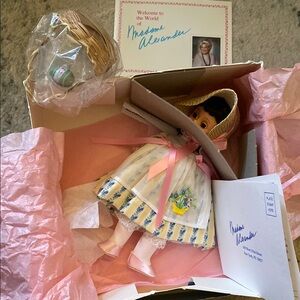 Vintage Doll with Floral Dress and Bonnet